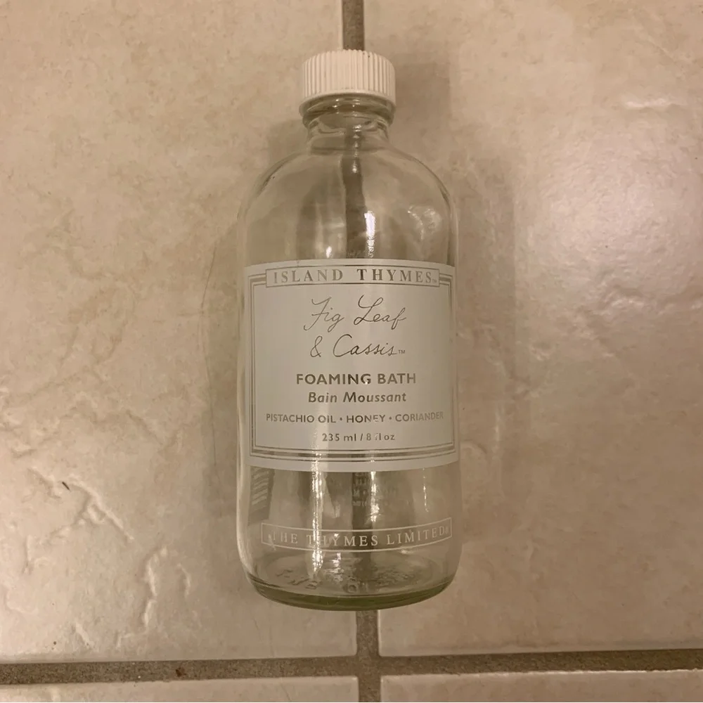 Free item: Empty glass bottle with white lettering